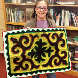 Jamie with felted rug from Kyrgystan