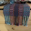 Fringe of deflected double weave